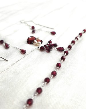 red necklace and earrings